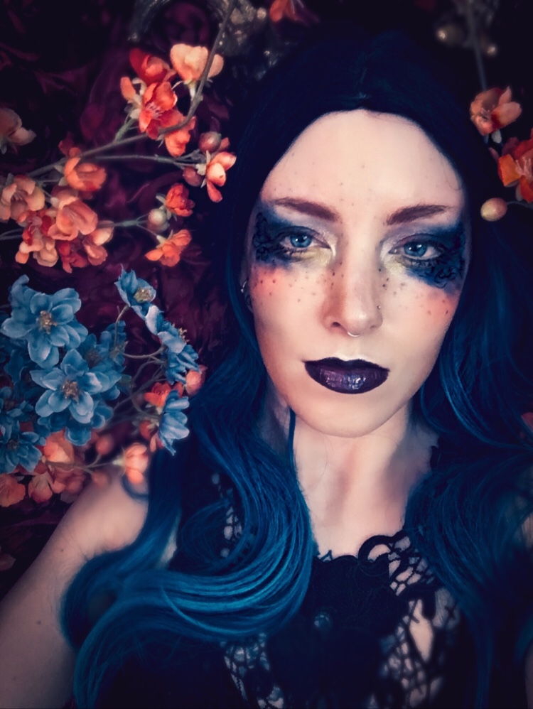 Glamour portrait featuring blue fantasy makeup 